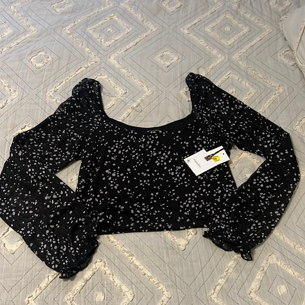 originality black polka dot top